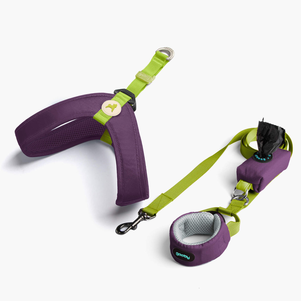 Solid purple step-in harness and matching leash set with a purple waste-bag dispenser