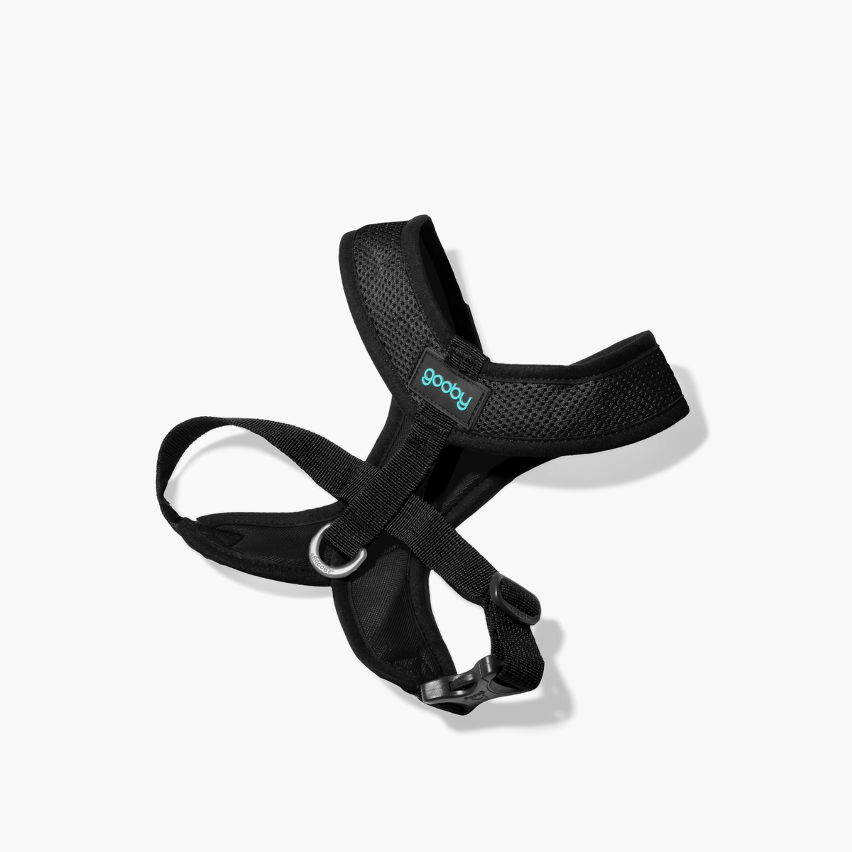 Black Comfort X harness shown at an angle on a white background