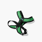 Hunter green Comfort X harness with black trim on a white background