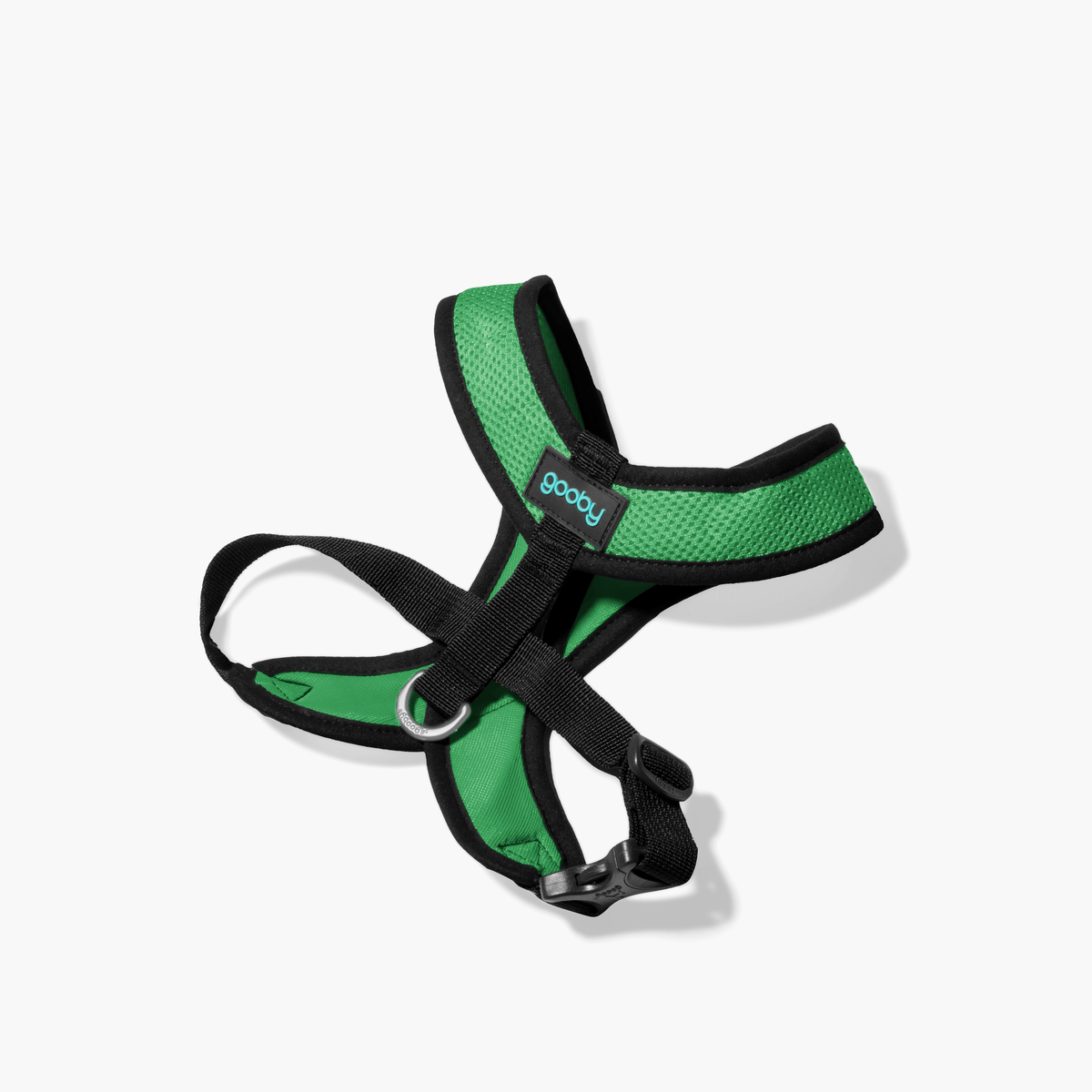 Hunter green Comfort X harness with black trim on a white background