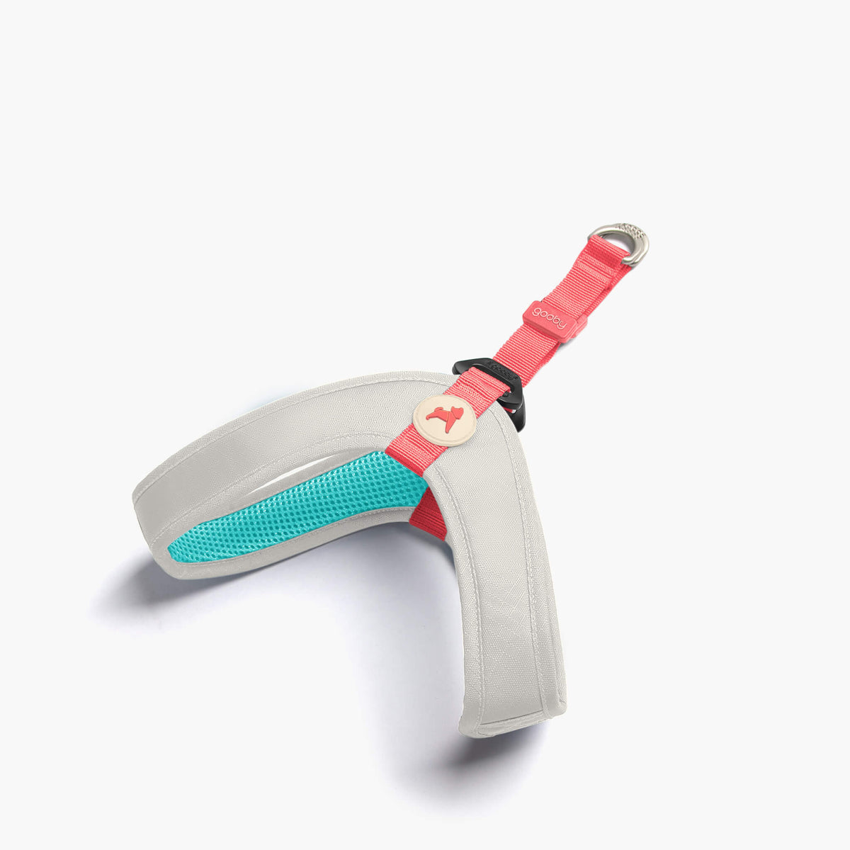 Solid cream step-in dog harness with turquoise lining and pink adjustable strap