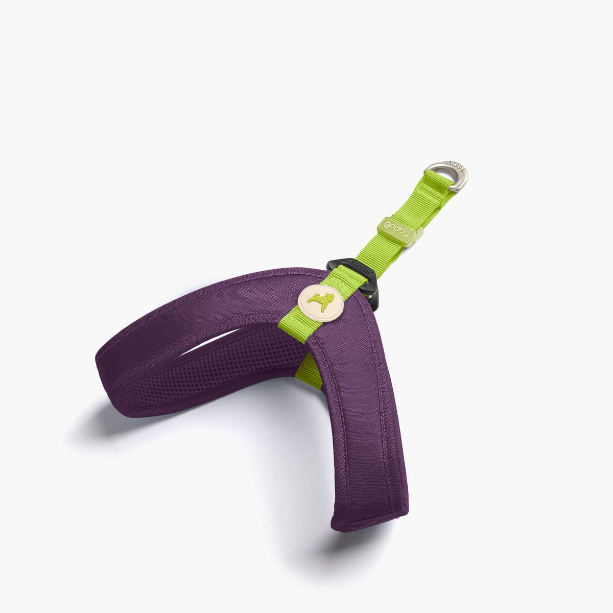Purple step-in harness with bright green adjustment straps on a white background