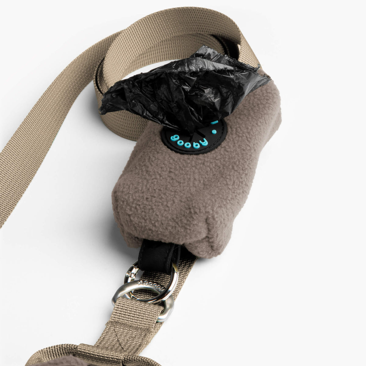 Close-up of a Warm Gray fleece vest and matching leash with metal clip