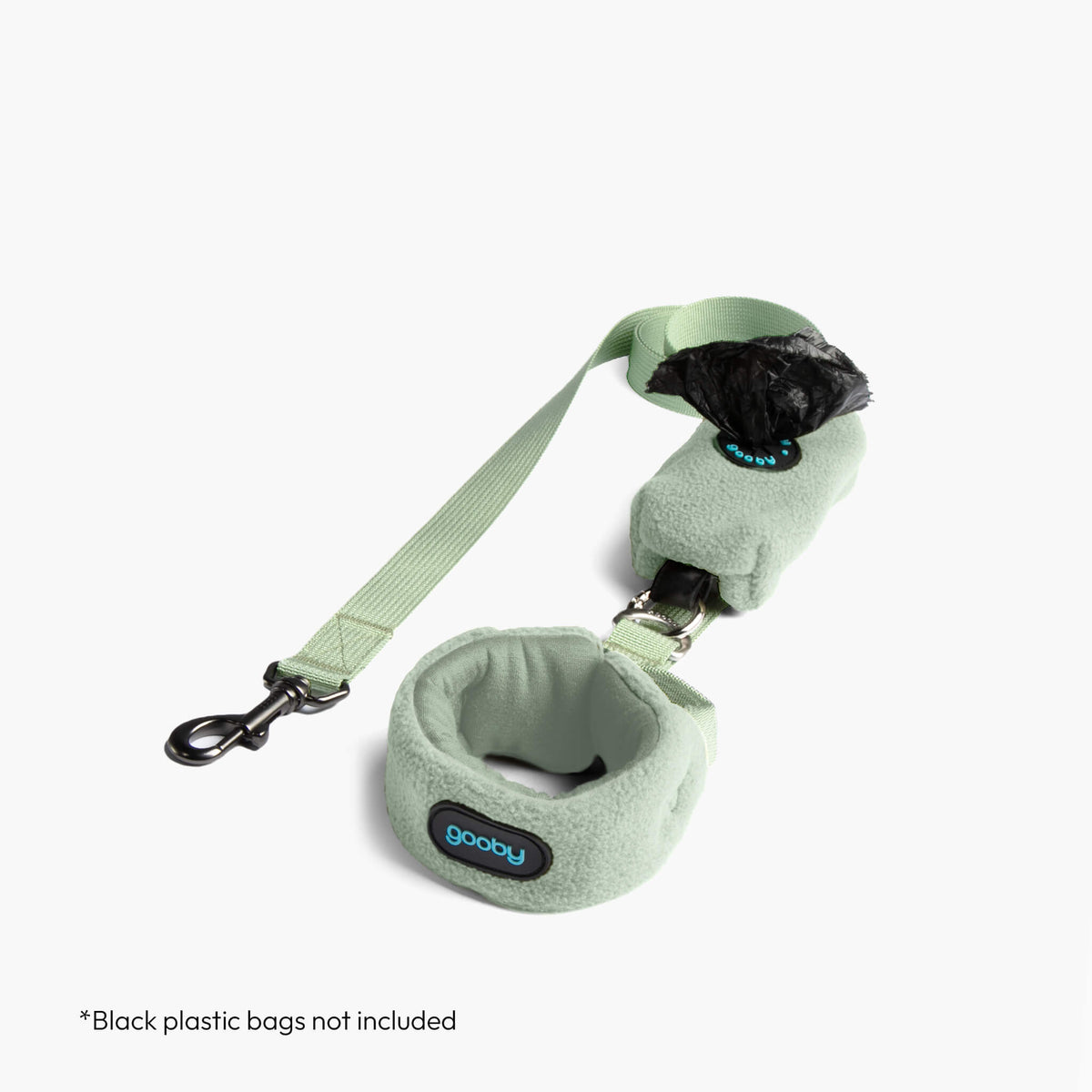 Mint fleece vest with matching leash and waste bag holder; black plastic bags not included.