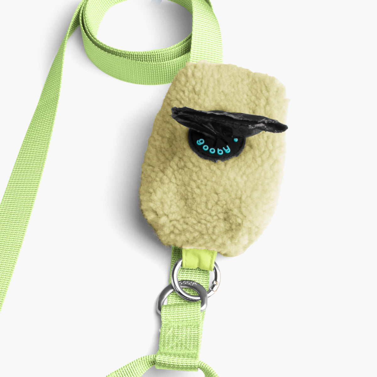 Close-up of an avocado sherpa leash with a plush fleece attachment and metal clip