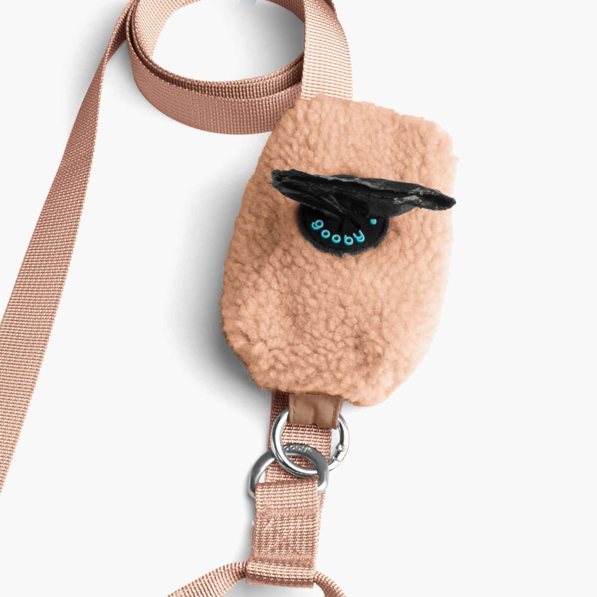Close-up of a mocha sherpa pouch and matching leash hardware