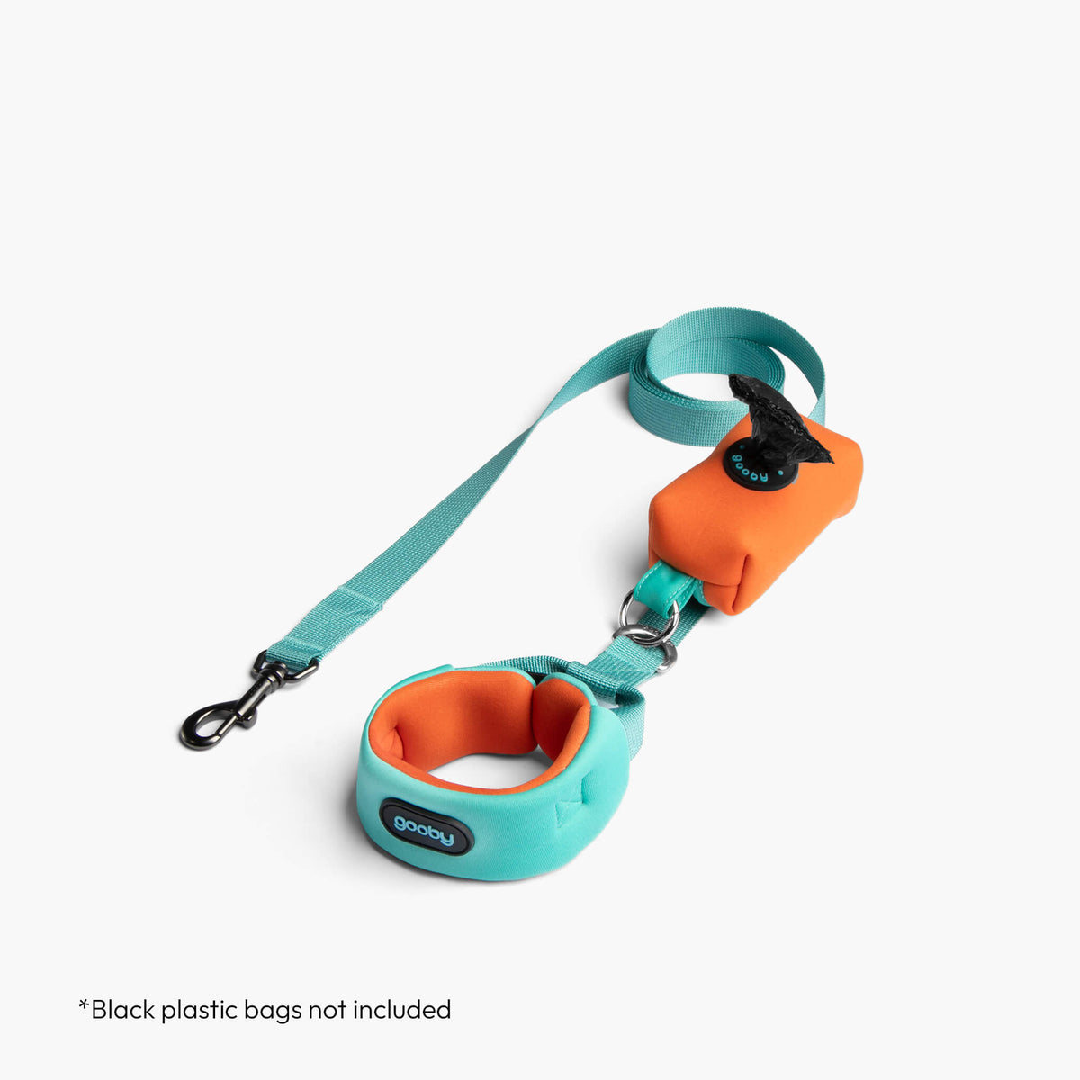 Mint Escape Free sport harness with matching leash and orange lining; black plastic bags not included.
