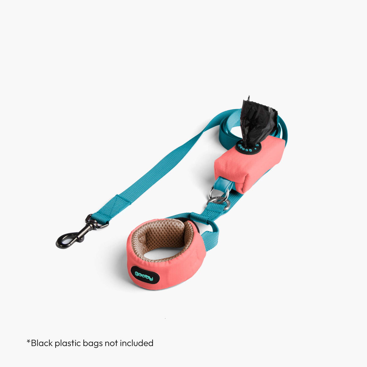 Solid pink step-in harness and matching teal leash set; black plastic bags not included.