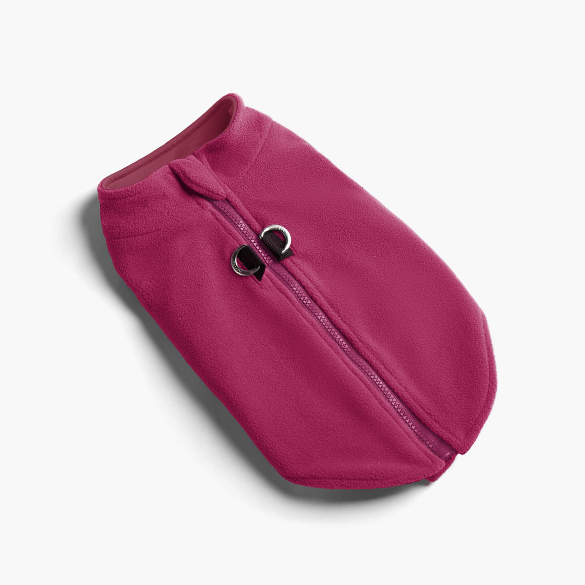 Magenta zip-up fleece vest with front zipper and two metal leash rings