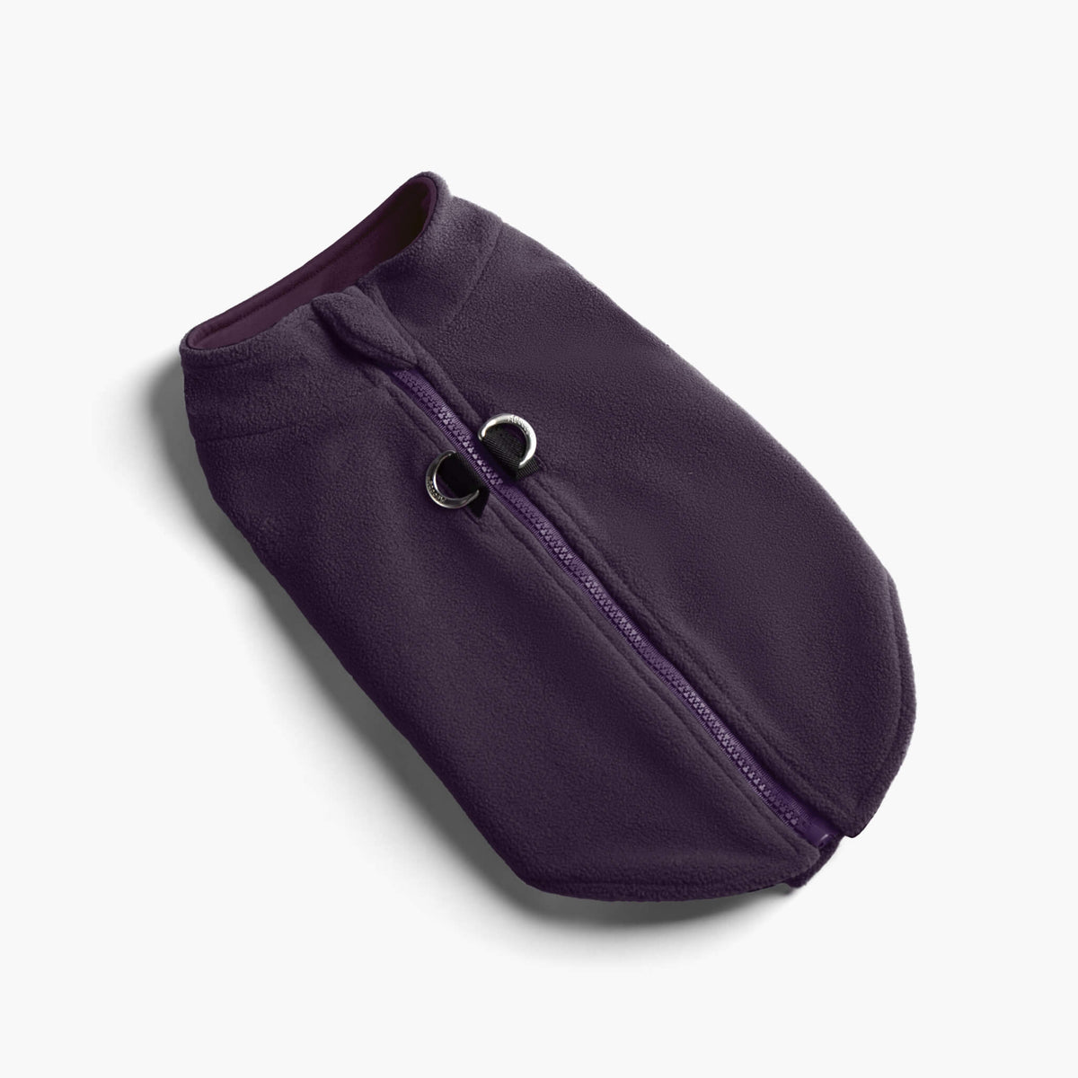 Purple zip-up fleece vest for dogs, shown at an angled view