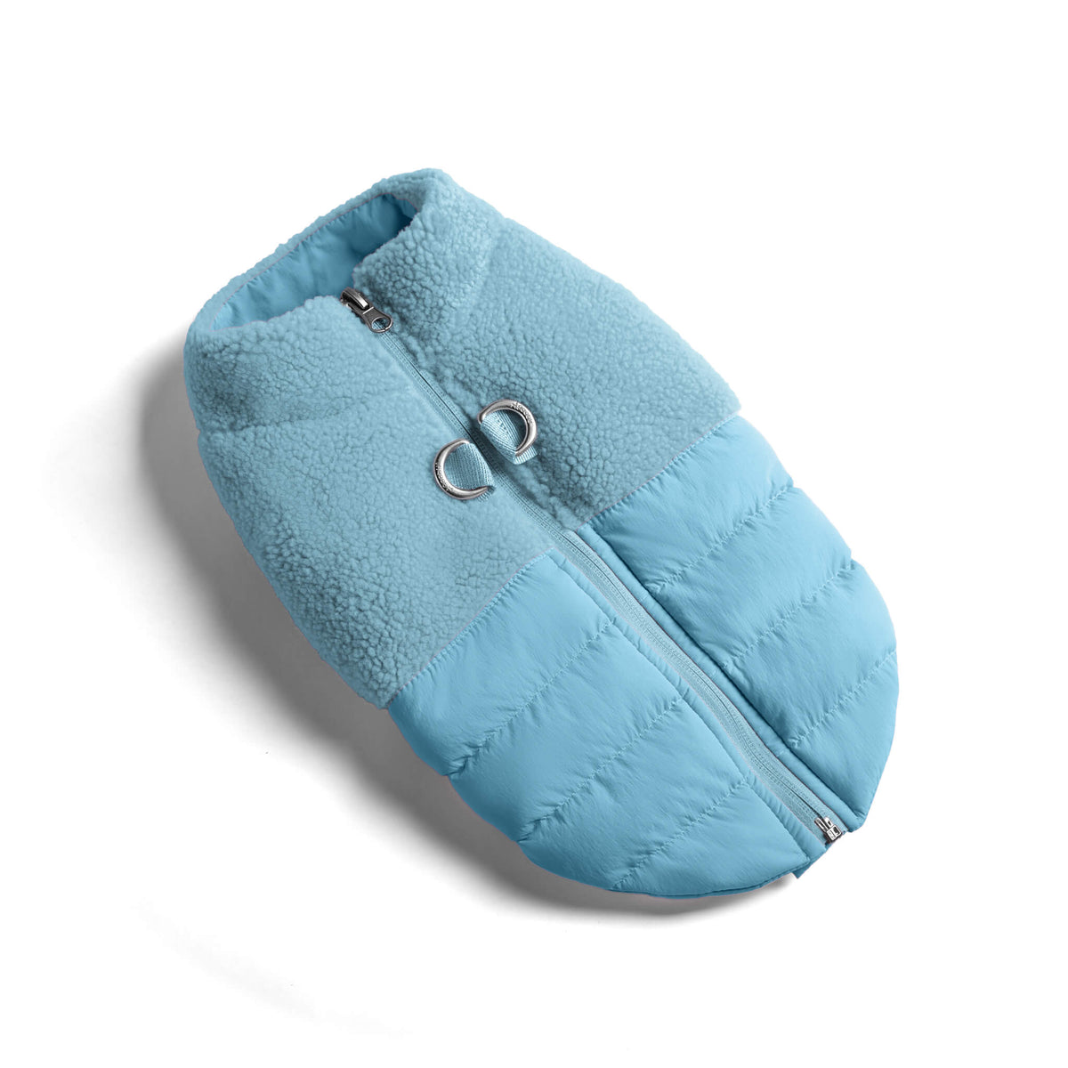 Baby blue sherpa puffer vest with a zip front and metal leash ring
