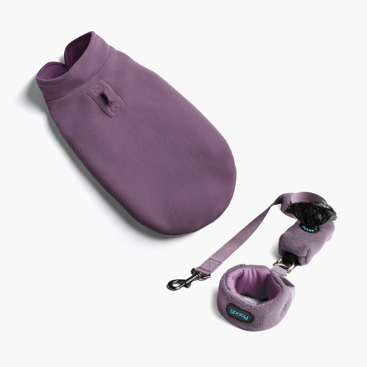 Lavender fleece dog vest and matching leash set on a white background