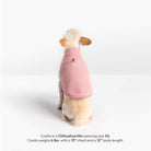 Small dog wearing a pink Everyday Fleece vest, shown from the back