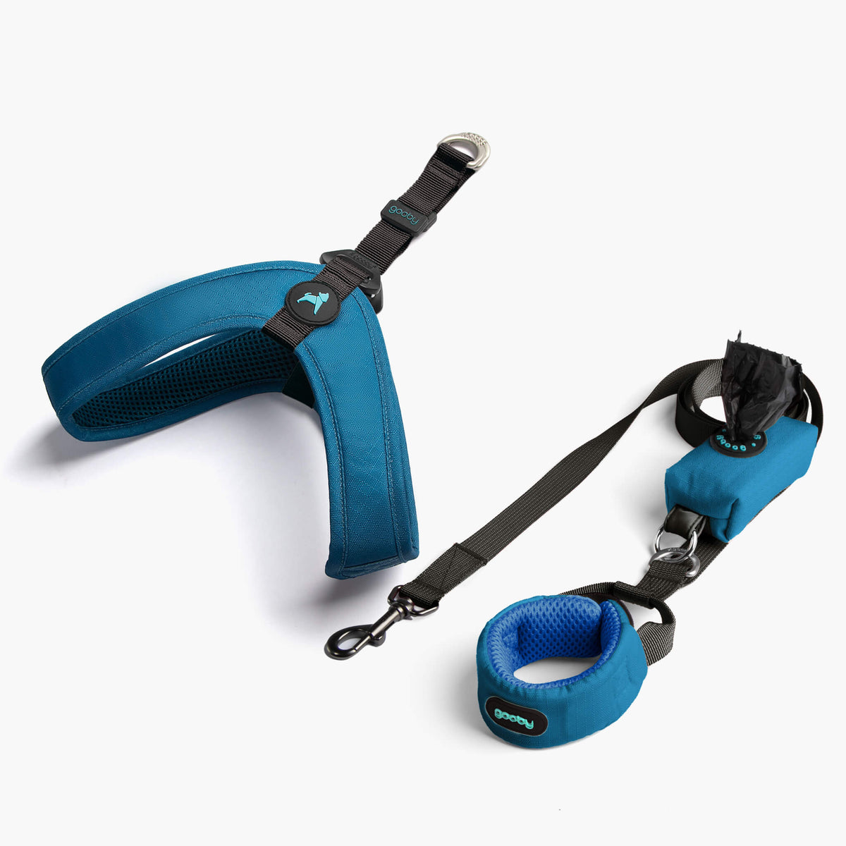 Solid blue step-in harness matching set with leash and collar on a white background